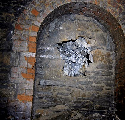 Another of the refuges, with a hole created in the stonework.