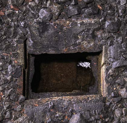 A solitary open catchpit offers a view of the substantial drain - still apparently functioning - beneath the former six-foot.