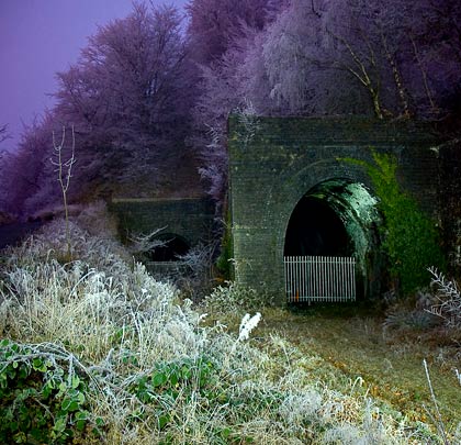 The two single bore tunnels at Clydach, built 15 years apart, which succumbed to economic frugality in 1958.                                            Photo: Sparhawk