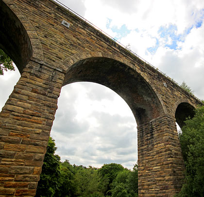 Bull-faced sandstone was used during construction, except for the arch barrels which are red brick.