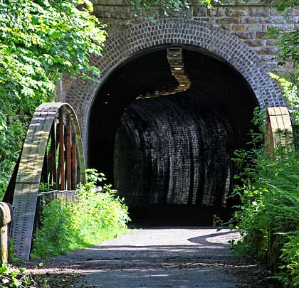 On the immediate approach to the tunnel's western end is a short bowstring girder bridge. Both hosted a single track.