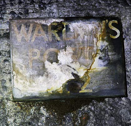 A 'Warden Point' sign provides a clue to the tunnel's wartime role.