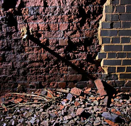 Some spalled brickwork has benefitted from patch repairs.