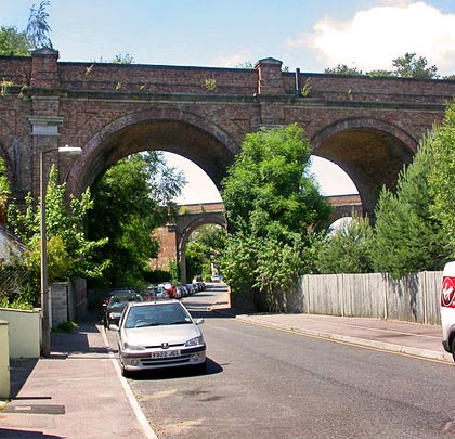 Gordon Road passes beneath a single-arch towards the south end.