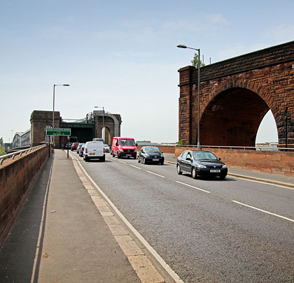 A short iron span formerly bridged the gap between the main structure and the masonry approach viaduct.