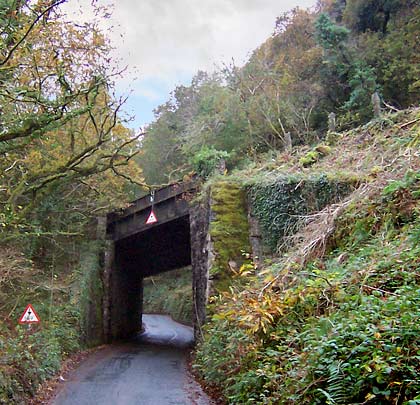 Just south of the viaduct, an iron girder bridge takes the trackbed over a narrow lane.