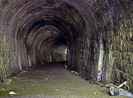 Throughout, the tunnel follows a curved alignment of about 25 chains in radius.