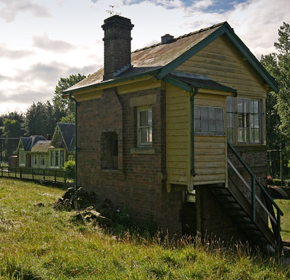 The station building, beyond the box, is now a private home.