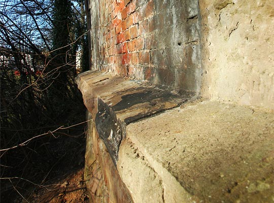 Despite its inherent quality, some stonework is deteriorating due to the weather's impact.