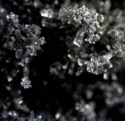 Crystals have formed on the tunnels' soot deposits.