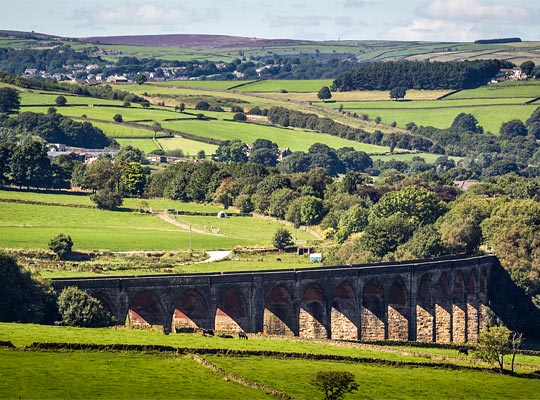 Heading west, the railway left the viaduct behind and passed through a tree-lined cutting towards Cullingworth and Keighley.