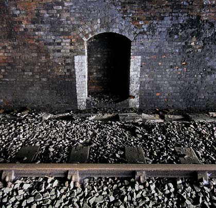 White paint helped trackworkers locate the tunnel's neat refuges.