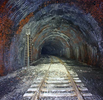 Although the central portion of the tunnel is straight, both ends feature curves to the east.