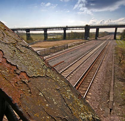 The Nottingham-Clay Cross line passes beneath the western span.