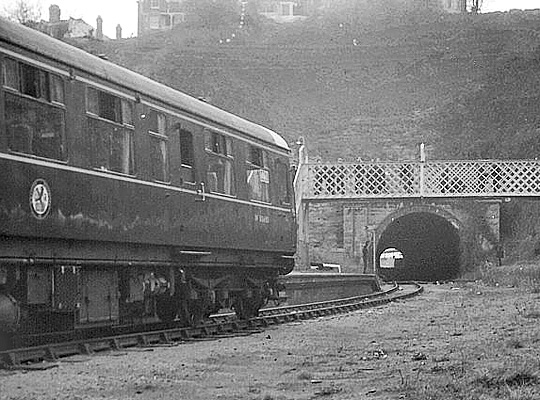 In April 1968, a Railtour DMU stands at Barry Pier Station before heading back through the tunnel.