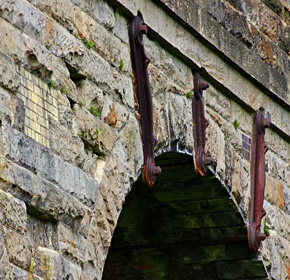 Tie bars, spalled masonry and brickwork repairs at one of the spans.