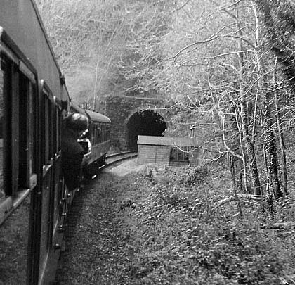 A DMU approaches the tunnel's eastern entrance.