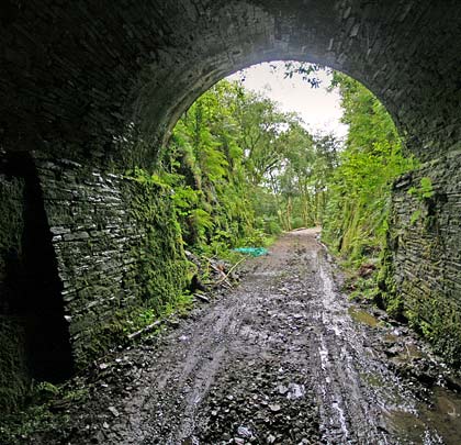 Looking south down the trackbed, between the portal's buttresses.