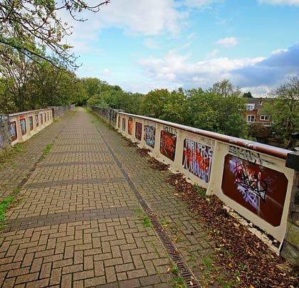 A target for graffiti, the skew span boasts a cast iron parapet, helping to protect users of the path that now crosses it.