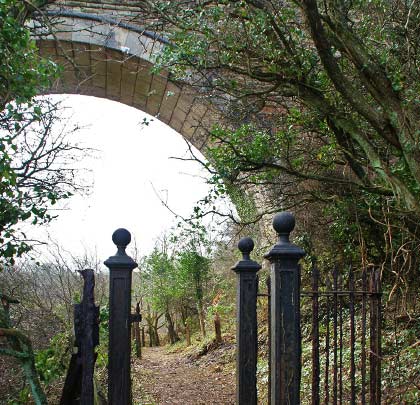 A footpath passes under the easternmost arch.