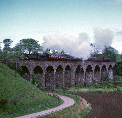 Marking the line's closure, J37 64547 hauls an Inverbervie-bound special across the viaduct on 22nd May 1966.