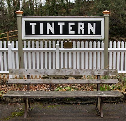 Though neither are original, the sign and bench are a nice touch.