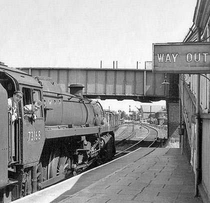 73168 waits to depart Ossett Station with a King's Cross service in 1962.