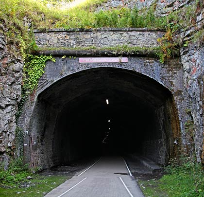 The west portal assists in revealing the tunnel's profile.