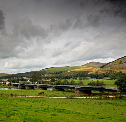 Around 400 feet in length, the bridge is overlooked by the southern end of the Moorfoot Hills.