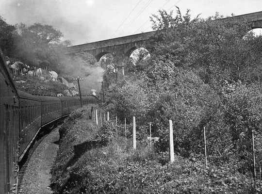 The view from a train passing under the viaduct on 27th May 1956.