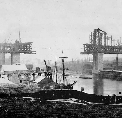 Temporary cantilevers were erected to support the main river span as it progressed across the river.