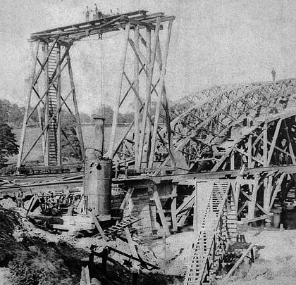 The bridge, under construction in 1876.