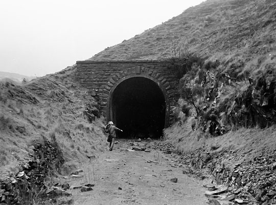 An archive shot of the east portal - free from vegetation - reveals the minimal amount of cover above the tunnel.