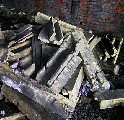 A pile of concrete troughing sections have also been abandoned.