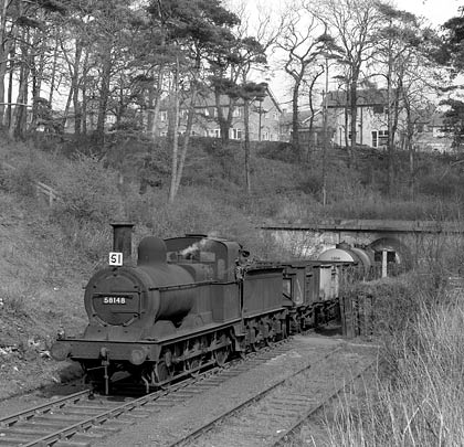 58148 leaves the tunnel with oil tanks on 2nd May 1963.